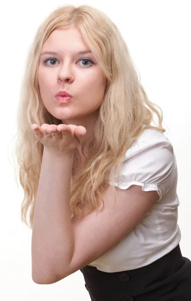 Beautiful young woman blowing a kiss — Stock Photo, Image