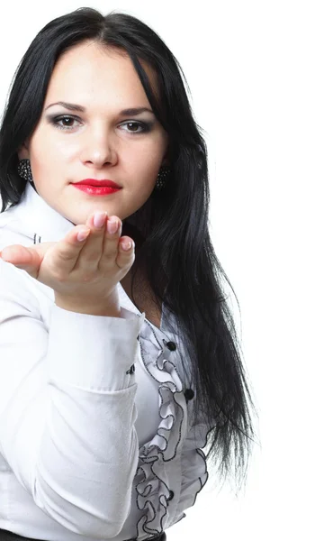 Hermosa joven mujer soplando un beso — Foto de Stock