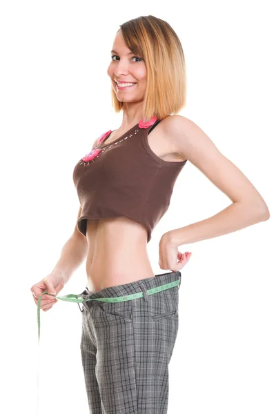 Pretty woman shows her weight loss wearing measure tapes isolate — Stock Photo, Image