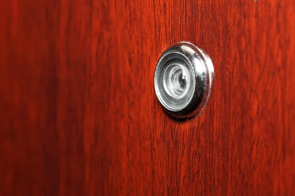 Peephole on wooden door — Stock Photo, Image