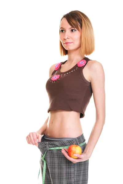 Young woman apple carrying a weight scale — Stock Photo, Image