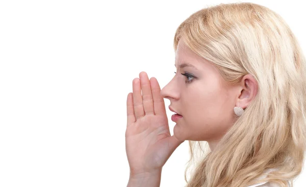 Woman eavesdropping with hand behind her ear — Stock Photo, Image