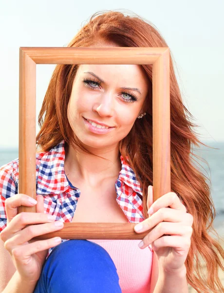 Woman Holding Frame travel concept — Stock Photo, Image