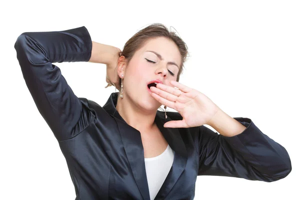 Sleepy business woman yawning and stretching, isolated — Stock Photo, Image