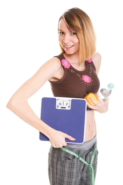 Bela jovem caucasiana medindo seu corpo com fita iso — Fotografia de Stock