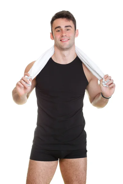 Healthy young man with towel isolated — Stock Photo, Image