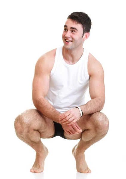 Healthy happy young man with towel isolated — Stock Photo, Image