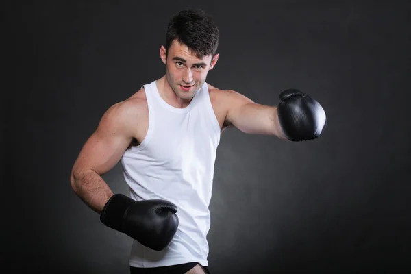 Portrait sportsman boxer in studio dark background — Stock Photo, Image