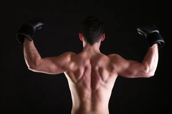 Strong athletic muscle man sports guy showing his muscles — Stock Photo, Image