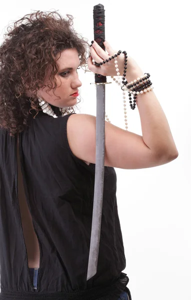 Portrait curly woman curly girl and sword — Stock Photo, Image