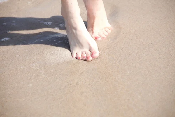 Nice legs in water — Stock Photo, Image