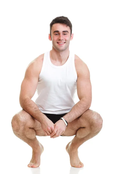 Healthy happy young man with towel isolated — Stock Photo, Image