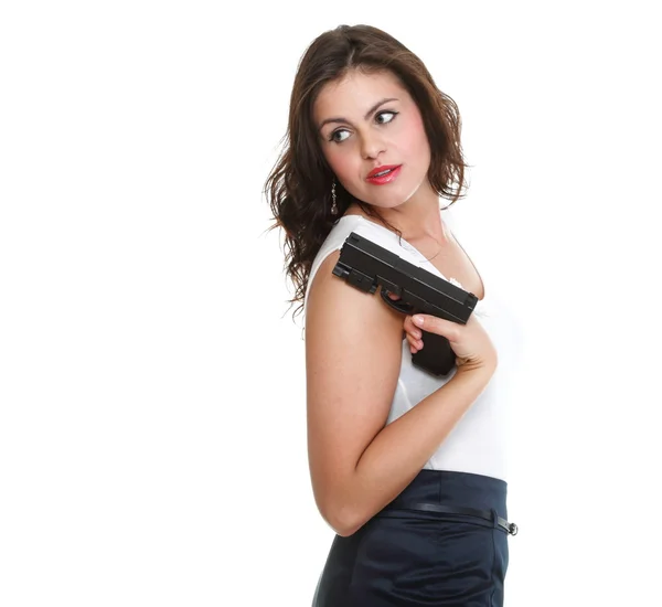 Junge brünette Frau mit Waffe isoliert auf weiß — Stockfoto