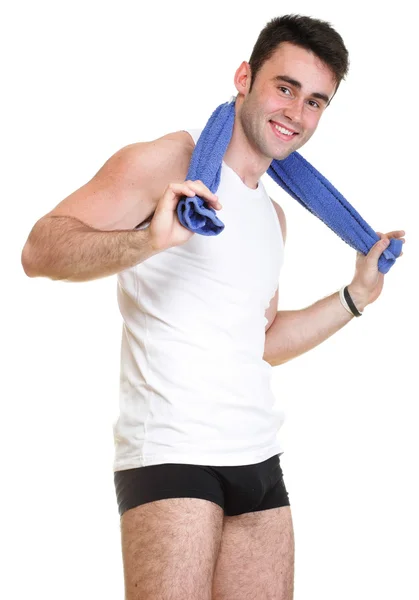 Gezond gelukkig jonge man met een handdoek geïsoleerd — Stockfoto