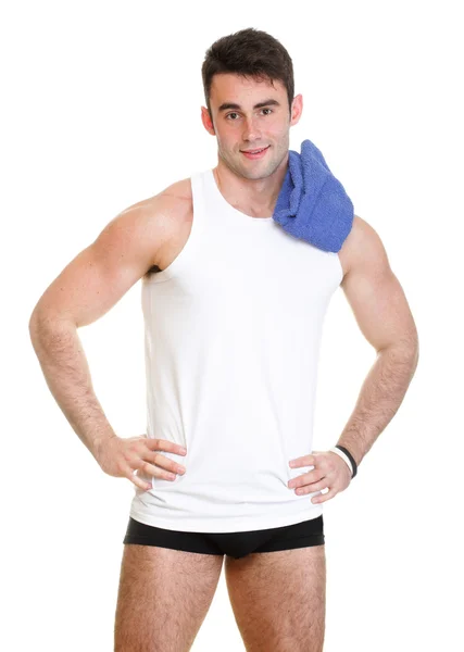 Gezond gelukkig jonge man met een handdoek geïsoleerd — Stockfoto