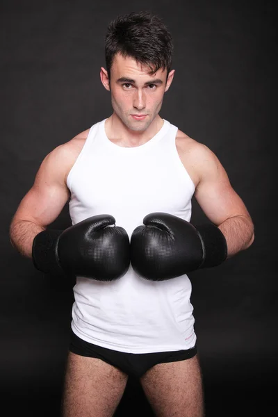 Strong athletic muscle man sports guy showing his muscles — Stock Photo, Image