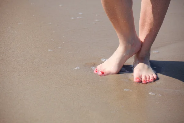 Nice legs in water — Stock Photo, Image