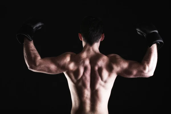 Strong athletic muscle man sports guy showing his muscles — Stock Photo, Image