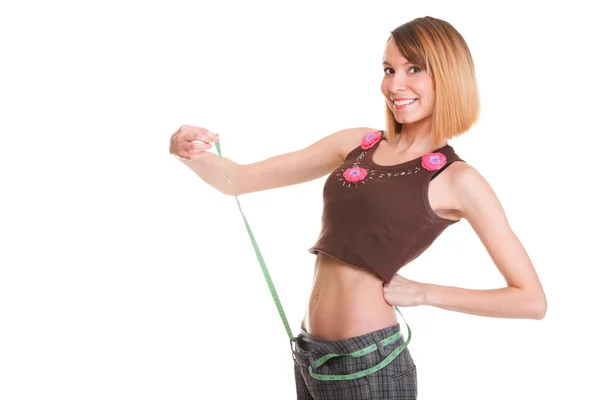 Pretty woman shows her weight loss wearing measure tapes isolate — Stock Photo, Image