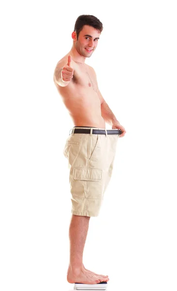 Muscular male body man showing thumb up Stock Image