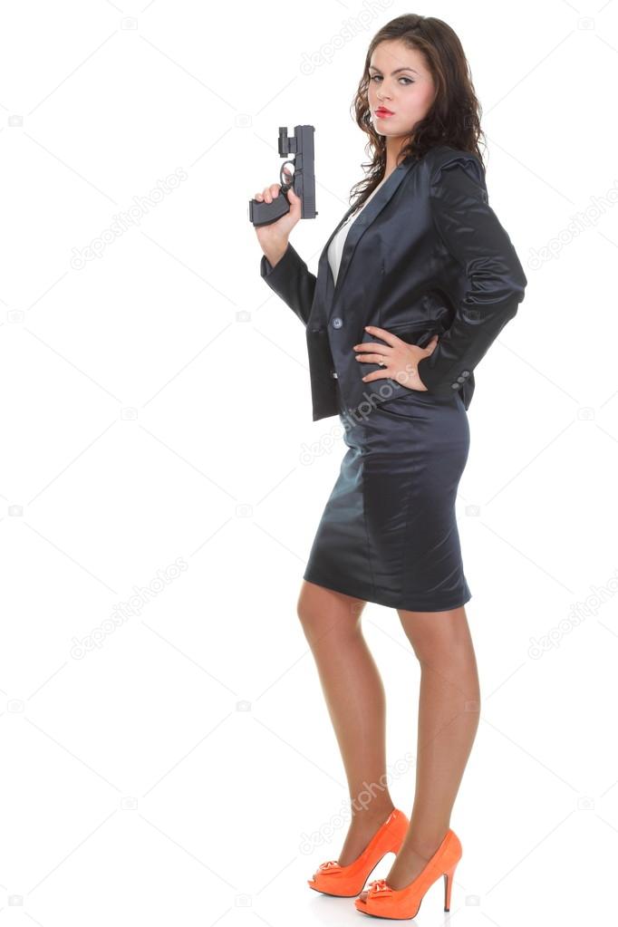 Young brunette woman with gun isolated on white