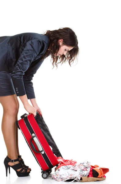 Full length young business woman to late red travel bagd — Stock Photo, Image