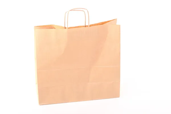 Winkelen bruin geschenk zakken geïsoleerd — Stockfoto