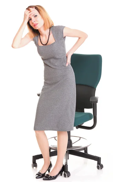 Business woman with back pain after long work on chair Isolated — Stock Photo, Image