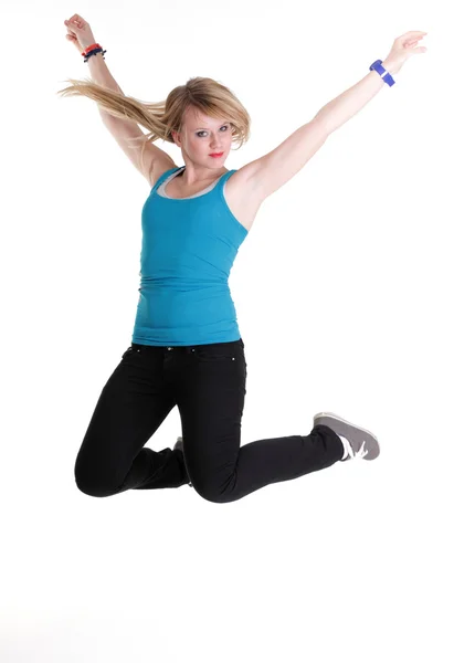 Young female Happy woman jumping with arms up isolated — Stock Photo, Image