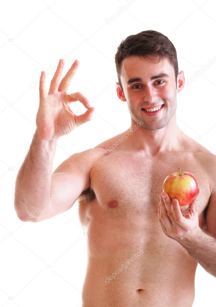 young man with some fresh red apple isolated