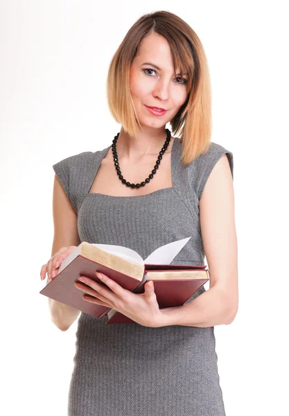 Mooie jonge vrouw met rode boeken geïsoleerd — Stockfoto