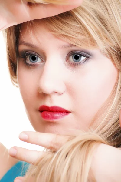 Beautiful woman framing her face with her hands isolated — Stock Photo, Image