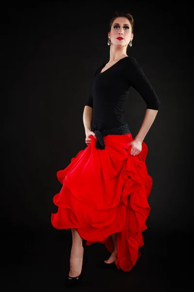 Dance. Spanish girl in red skirt dancing flamenco — Stock Photo, Image