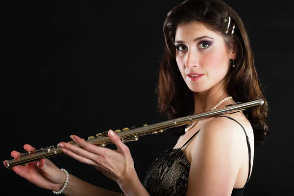 Art. Woman flutist flautist with flute. Music. — Stock Photo, Image