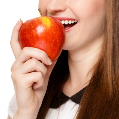Diet. Girl eating biting apple seasonal fruit. clipart