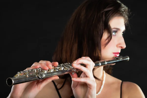 Art. Woman flutist flautist playing flute. Music. — Stock Photo, Image