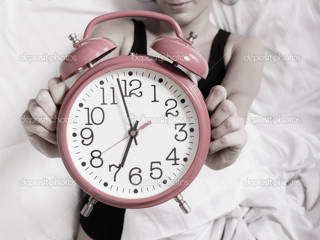 Alarm clock with female hands