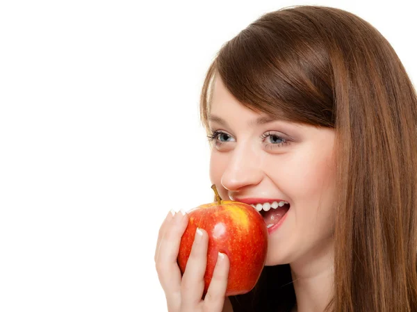 ダイエット。刺すようなアップルの季節のフルーツを食べる少女. — ストック写真