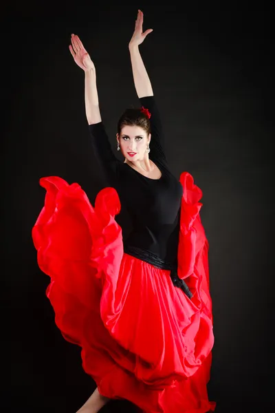 Dance. Spanish girl in red skirt dancing flamenco — Stock Photo, Image