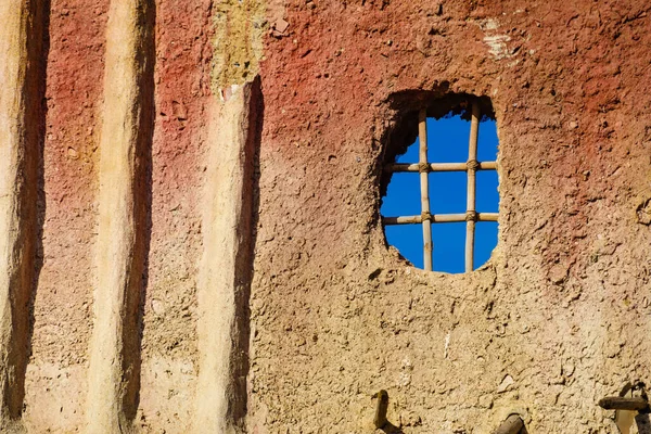 Old clay house detail, bars in window. El Chorrillo film location, Sierra Alhamilla in Andalucia Spain.