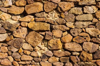 Taş duvar. Kahverengi arkaplan dokusu
