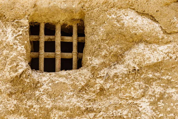 Old clay house detail, bars in window. El Chorrillo film location, Sierra Alhamilla in Andalucia Spain.