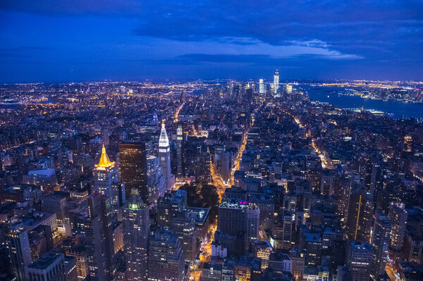Photo of New York skyscrapers taken from The Empire State Building at night