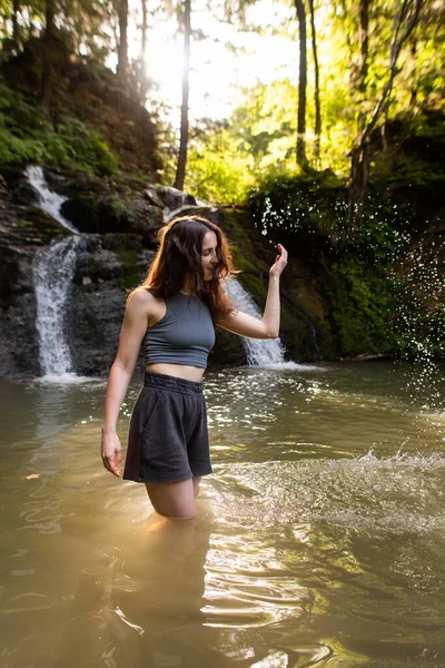 Young Woman Stands Waterfall — 스톡 사진