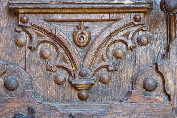 Parte della figura scolpita porte in legno — Foto Stock