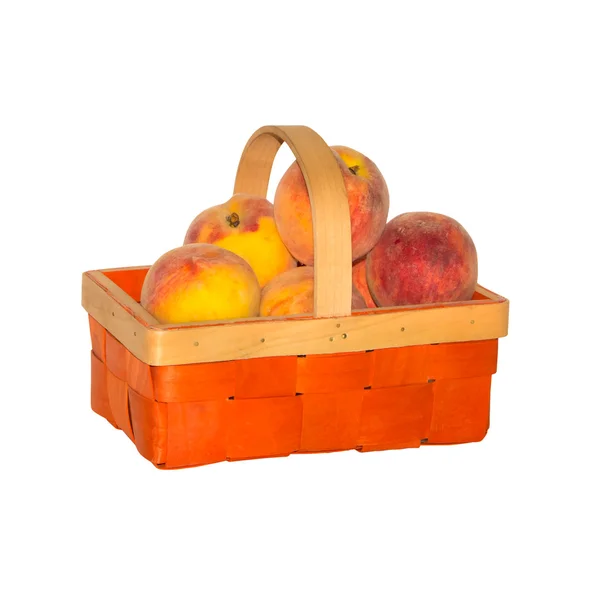Pêssegos em uma cesta — Fotografia de Stock