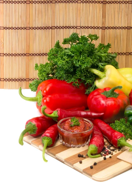 Mixture of peppers and sauce — Stock Photo, Image