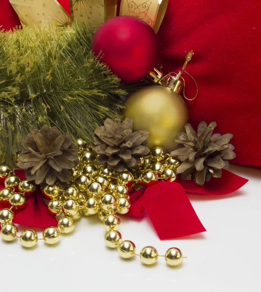 Christmas balls and pine cones — Stock Photo, Image