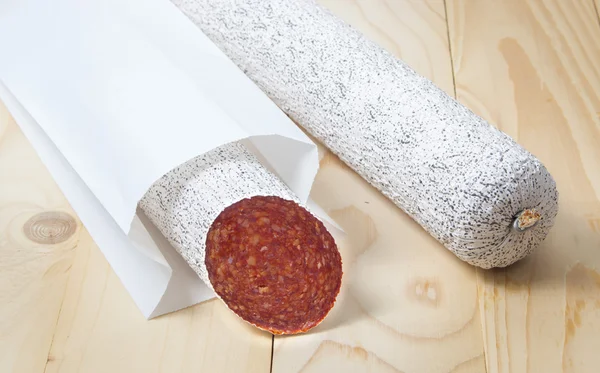 Salami with red pepper package — Stock Photo, Image