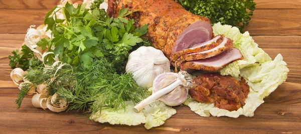 Baked boiled pork with greenery — Stock Photo, Image